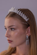 Luxury floral bridal headpiece shown from the opposite angle, featuring clear zircon branches and an elegant wedding silhouette.