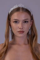 Close-up front view highlighting the symmetrical floral clusters and sparkling zircon centerpiece of the bridal tiara