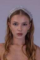 Close angled view of a zircon bridal tiara featuring paired marquise leaves and raised teardrop stones in a symmetrical crown design.