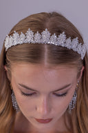 Top detail of the symmetrical zircon leaf pattern across this silver-plated bridal headpiece
