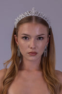 Royal silver bridal crown shown in profile, highlighting its sparkling fern leaves and refined wedding tiara structure