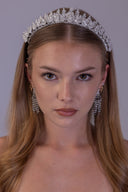 bride wearing a silver flower wedding crown with sparkling zircon leaves and a balanced botanical design.