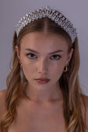 Luxury teardrop bridal crown shown in profile, highlighting its elevated center and sparkling silver zircon leaf arrangement.