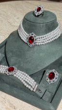 Bridal pearl bracelet with red zircon detail and luxury rhodium finish