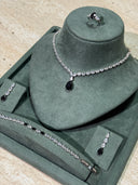Detailed view of black teardrop bridal necklace with sparkling crystal chain