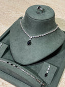 Bridal jewelry set featuring black teardrop necklace and matching ring