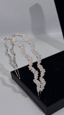 Side profile showing the double-row structure of a silver crystal leaf wedding headband